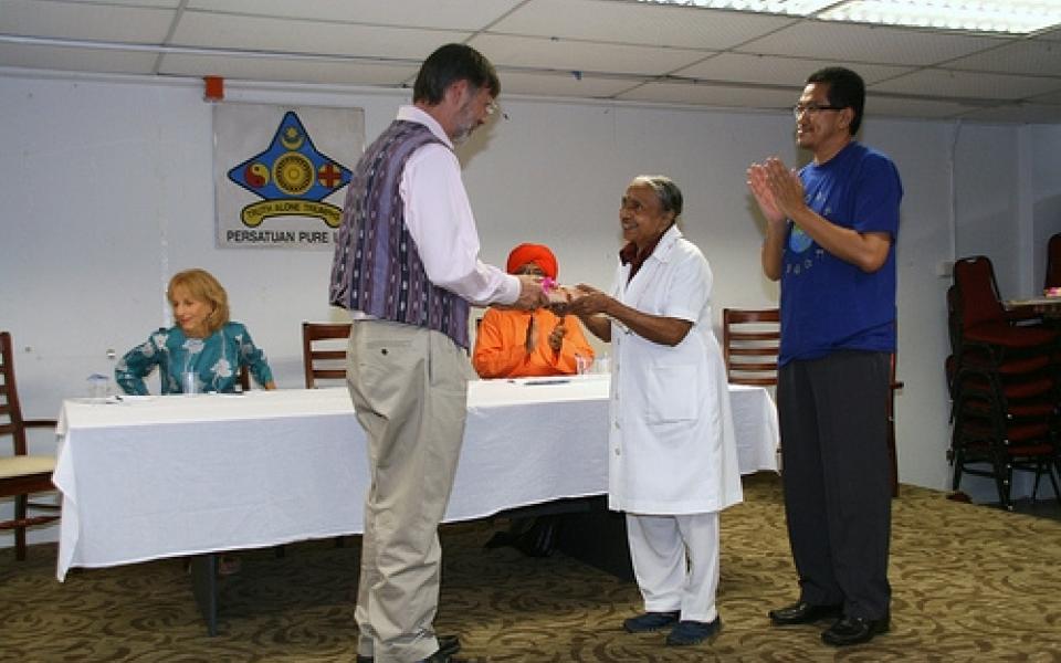 two men shaking hands