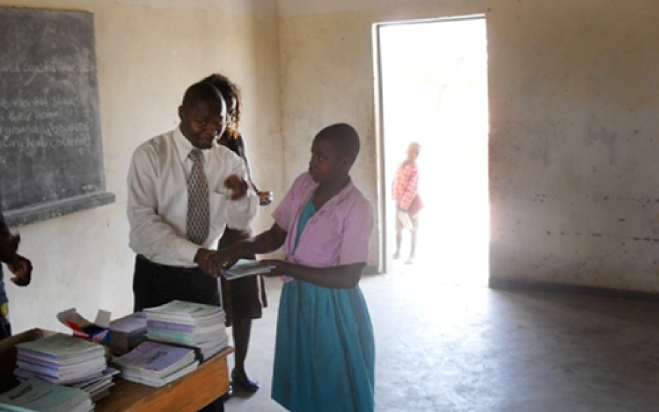 giving out paper