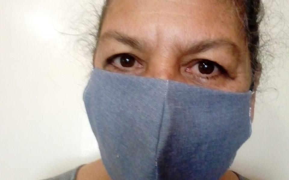 Photo: URI member using face mask